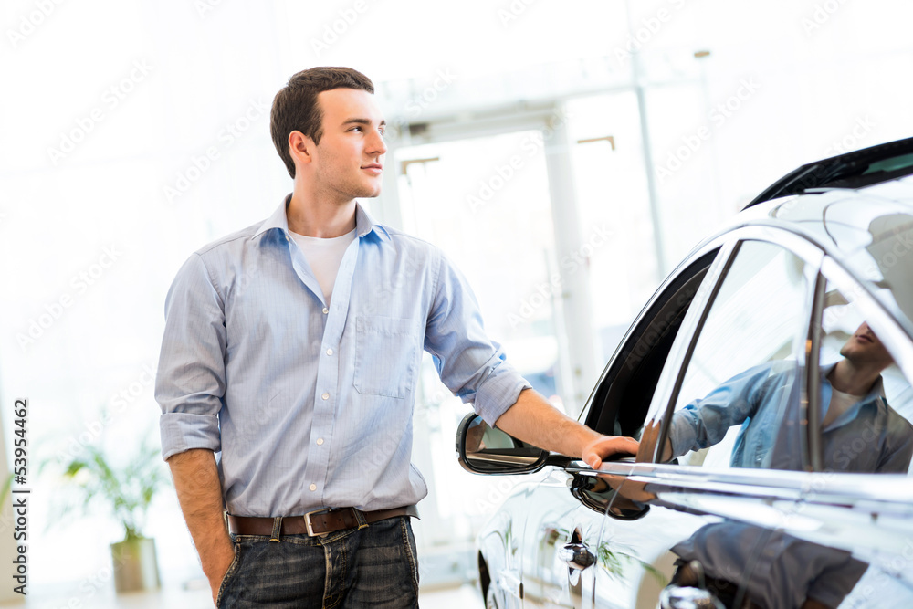 man standing near a car man standing near a car