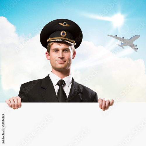 pilot in the form of holding an empty billboard photo