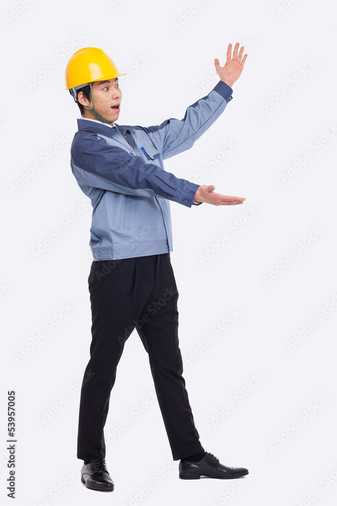 Young Asian engineer show something. Young Asian engineer show something.