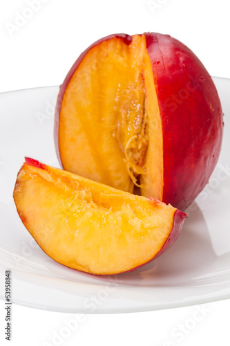 Nectarine on a white plate