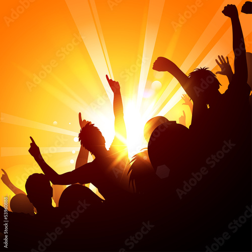 Cheering crowd at a concert in the sun
