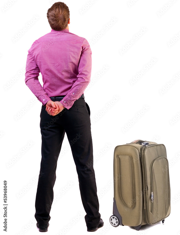 Back view of traveling busness man with  suitcase
