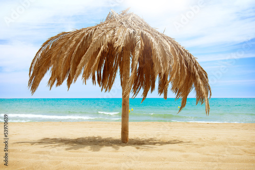Vacation Concept. Palapa Sun Roof Beach Umbrella © Subbotina Anna