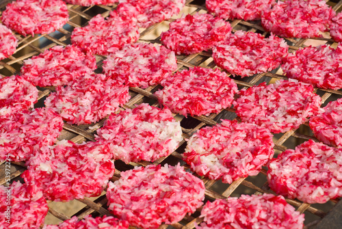 Sun-dried Sticky Rice Cakes on wicker mats in Chiengkarn, Leoi,