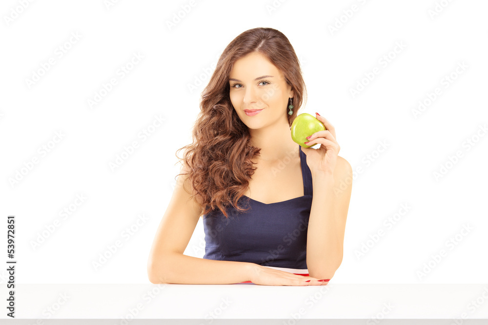 Beautiful female holding a green apple Beautiful female holding a green apple