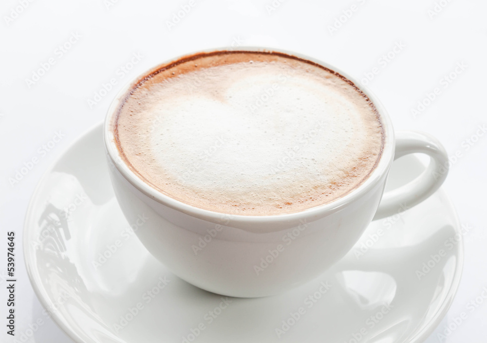 Heart shape of milk microfoam on coffee latte Heart shape of milk microfoam on coffee latte