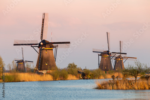 Windmills near Kinderdijk at sunset, South Holland, Netherlands