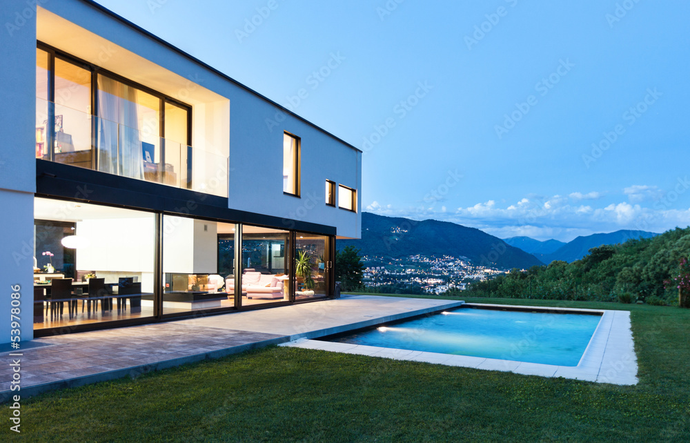 Fototapeta premium Modern villa with pool, night scene