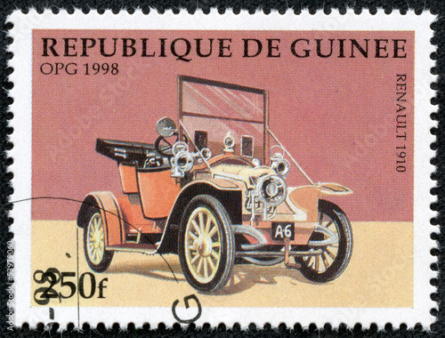 stamp printed in Guinea showing vintage car