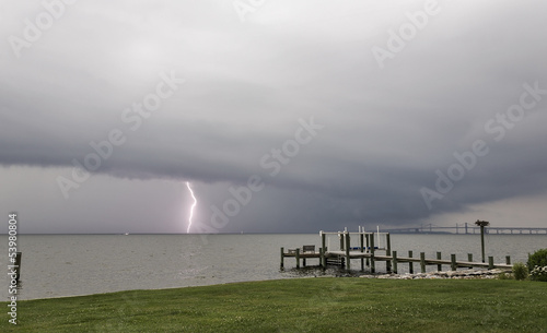 A bolt of lightening pierces the water in the Chesapeake Bay