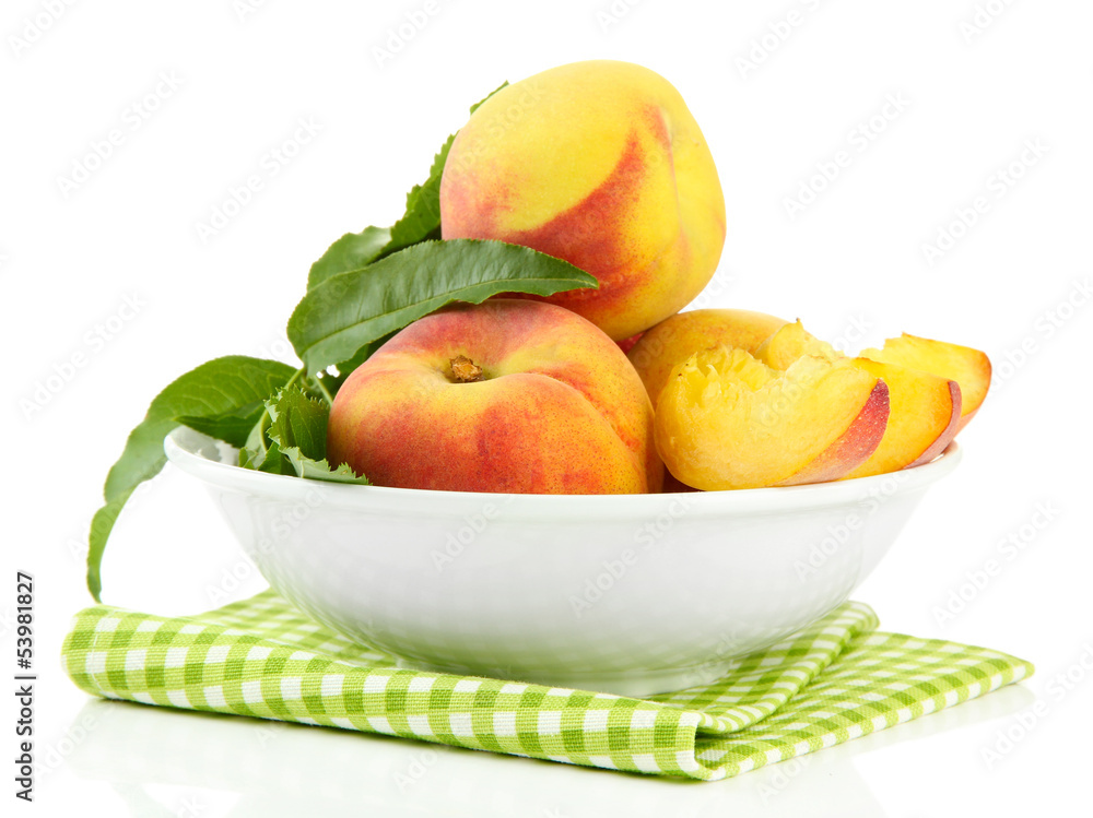 Ripe sweet peaches in bowl, isolated on white Ripe sweet peaches in bowl, isolated on white