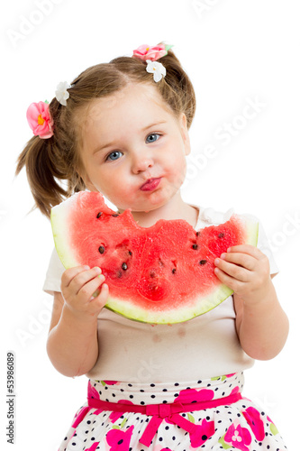 kid girl eating watermelon ...