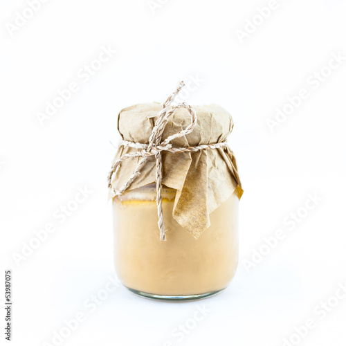 Beautiful Jar of custard isolated on white background.
