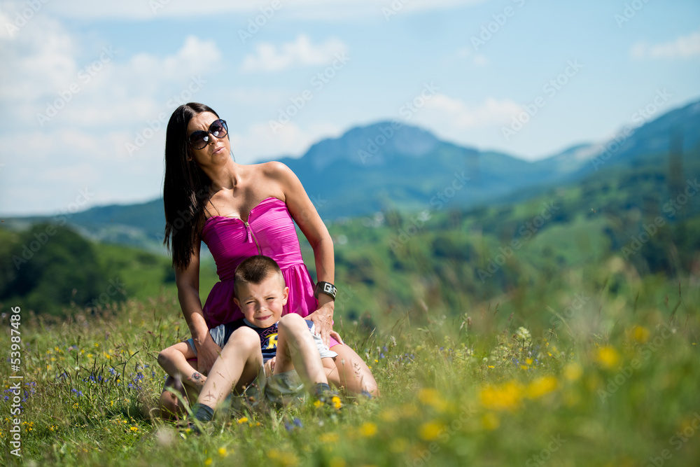 mother and son sitting and playing mother and son sitting and playing