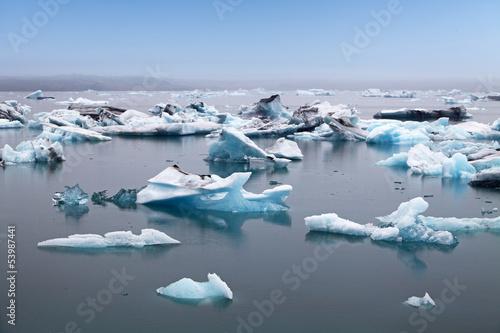 Blue icebergs floating in Jokulsarlon glacial lagook, Iceland