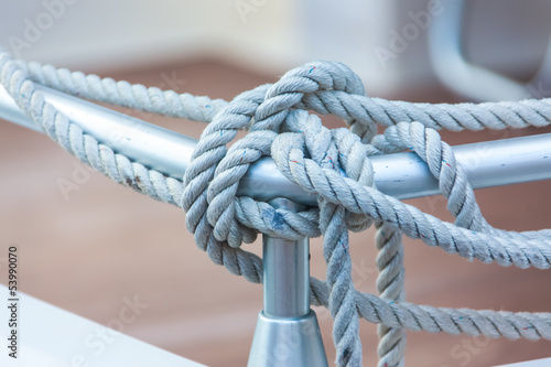 Mooring rope tied around steel anchor