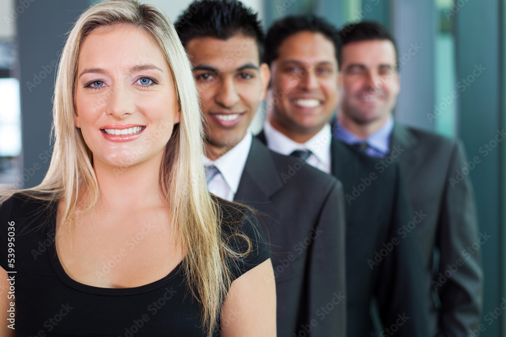 Obraz premium business group in a row smiling