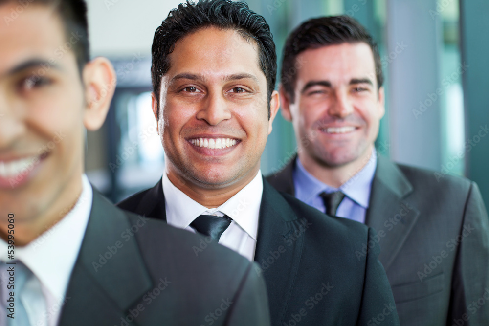 businessmen standing in a row businessmen standing in a row