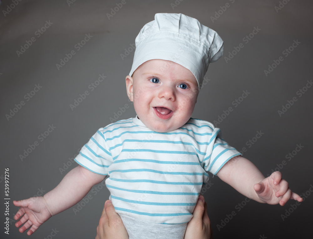 little chef with spoon in hand and hat little chef with spoon in hand and hat