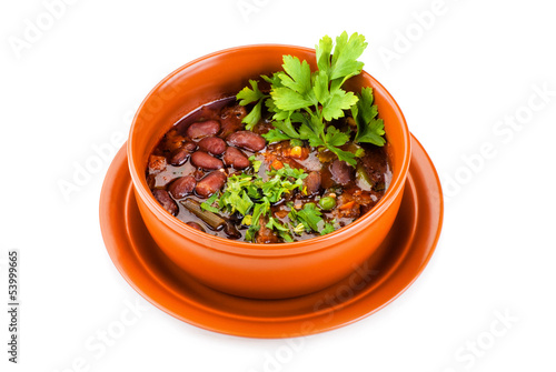 Bowl of mexican chili kidney bean soup with meat