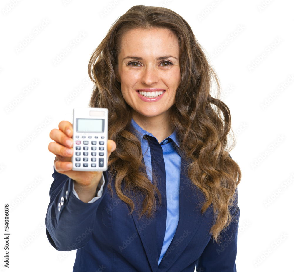 Smiling business woman showing calculator Smiling business woman showing calculator