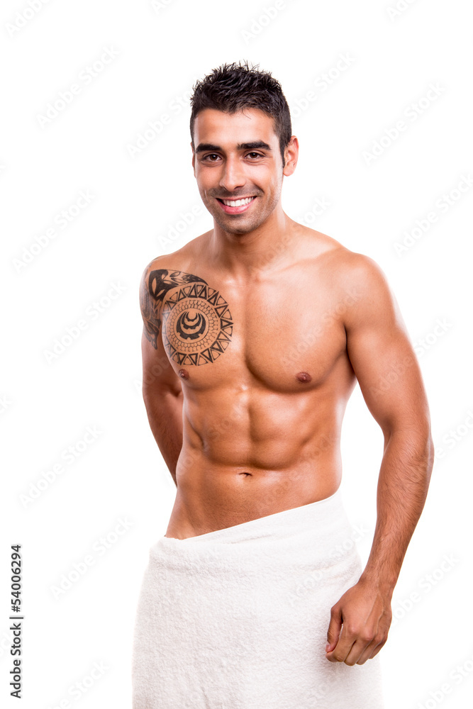 Attractive man posing with a white towel Attractive man posing with a white towel