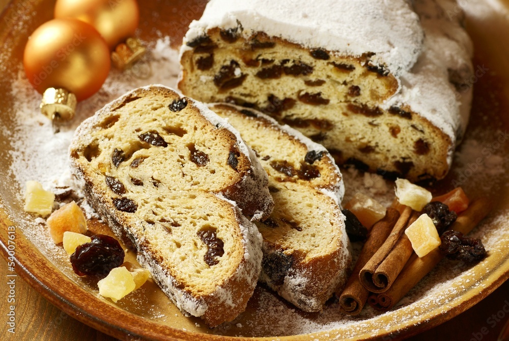 Christmas stollen, dried fruits, nuts and spices. Christmas stollen, dried fruits, nuts and spices.