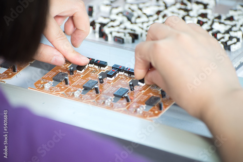 worker assembling electronic factory in China