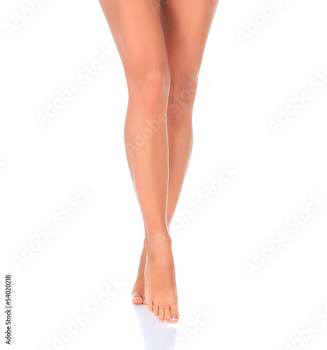 Beautiful woman legs against white background © Nobilior