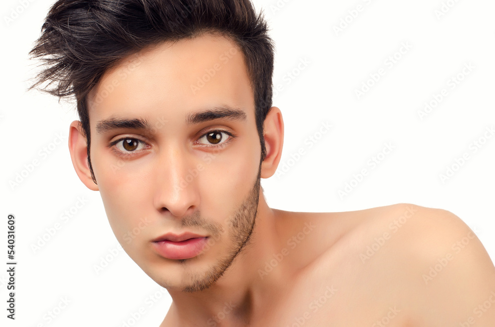 Portrait of a young beautiful man with half face shaved Portrait of a young beautiful man with half face shaved