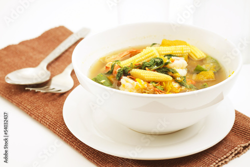 sspicy soup made from pork , spices and vegetables