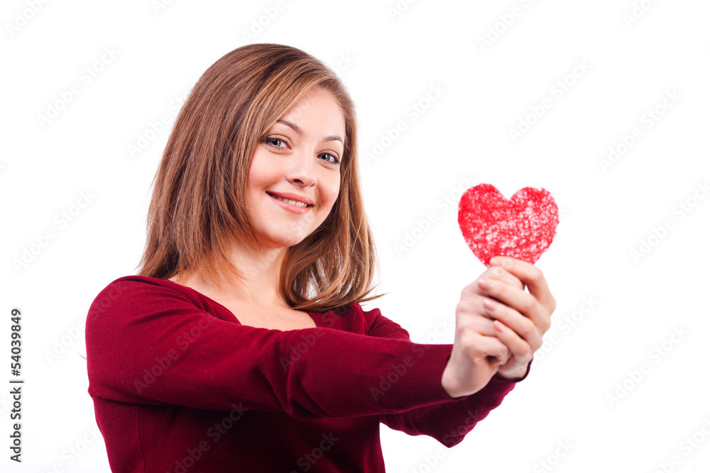 young smiling woman isolated on white background holding heart s young smiling woman isolated on white background holding heart s