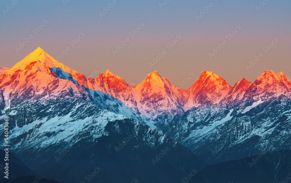 Naklejka premium sunset on Mountain Peaks 