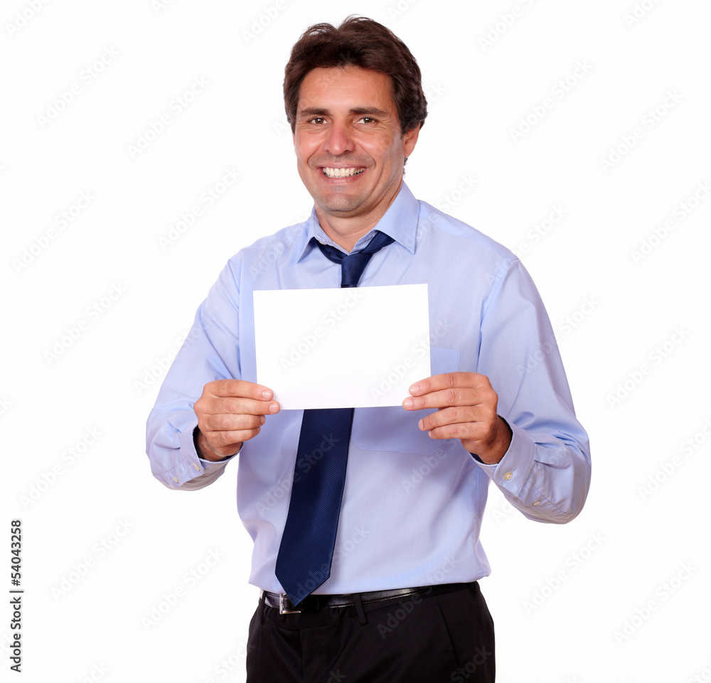 Attractive man smiling and showing you a card Attractive man smiling and showing you a card