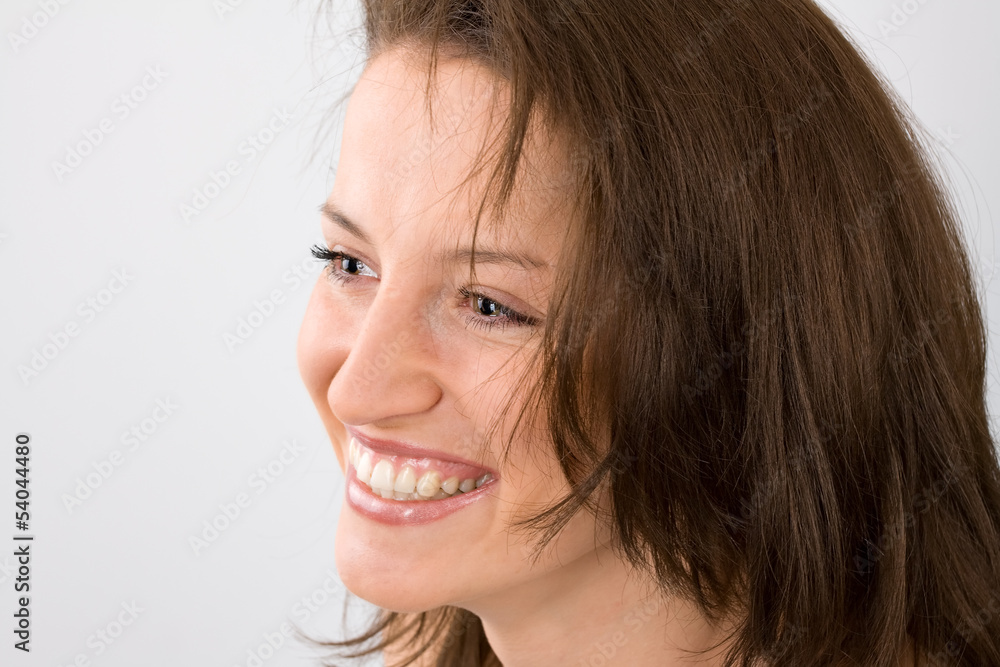 Smiling Girl on grey background Smiling Girl on grey background