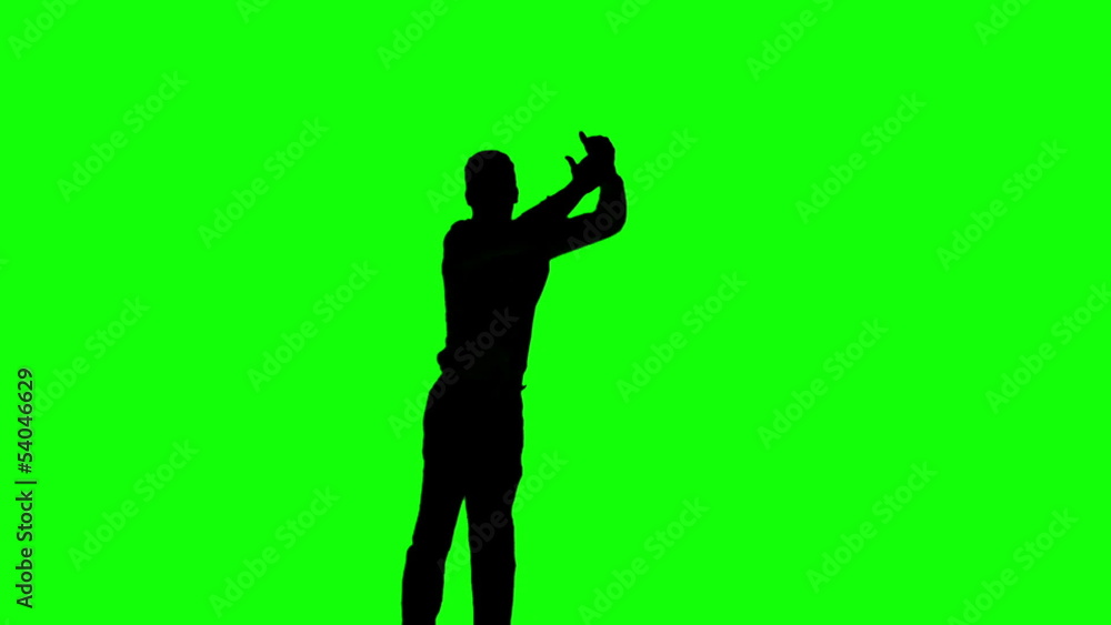 Silhouette of man jumping and giving thumb up on green screen Silhouette of man jumping and giving thumb up on green screen