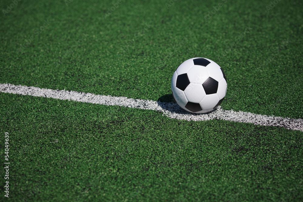 White stripe on the green soccer field from top view White stripe on the green soccer field from top view