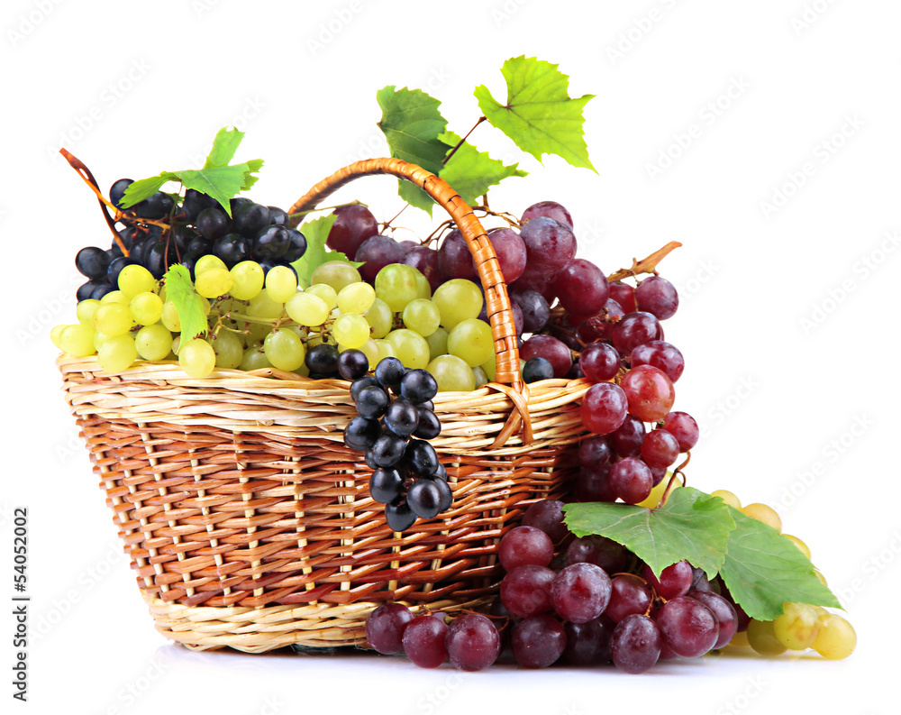 assortment of ripe sweet grapes in basket, isolated on white. assortment of ripe sweet grapes in basket, isolated on white.