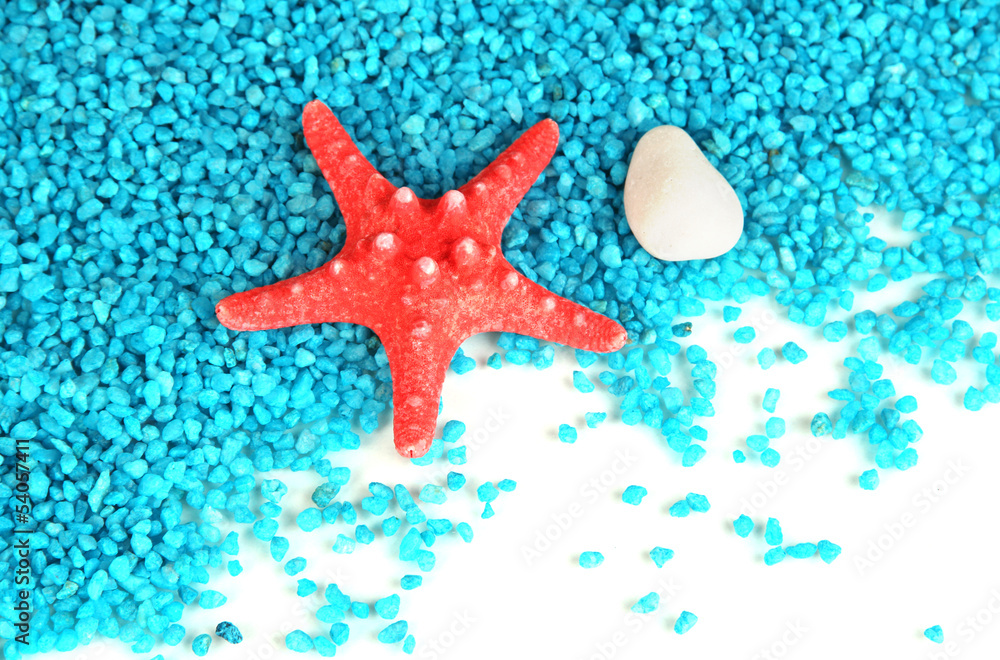 Starfish on blue crystals of sea salt background Starfish on blue crystals of sea salt background