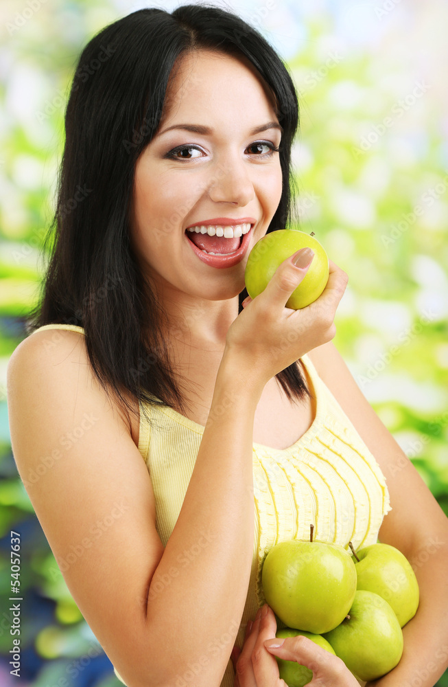 Girl with fresh apples on natural background Girl with fresh apples on natural background