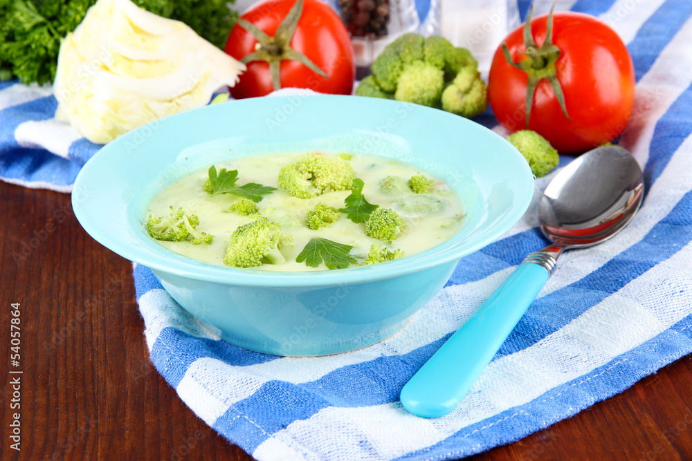 Cabbage soup in plates on napkin on wooden table Cabbage soup in plates on napkin on wooden table