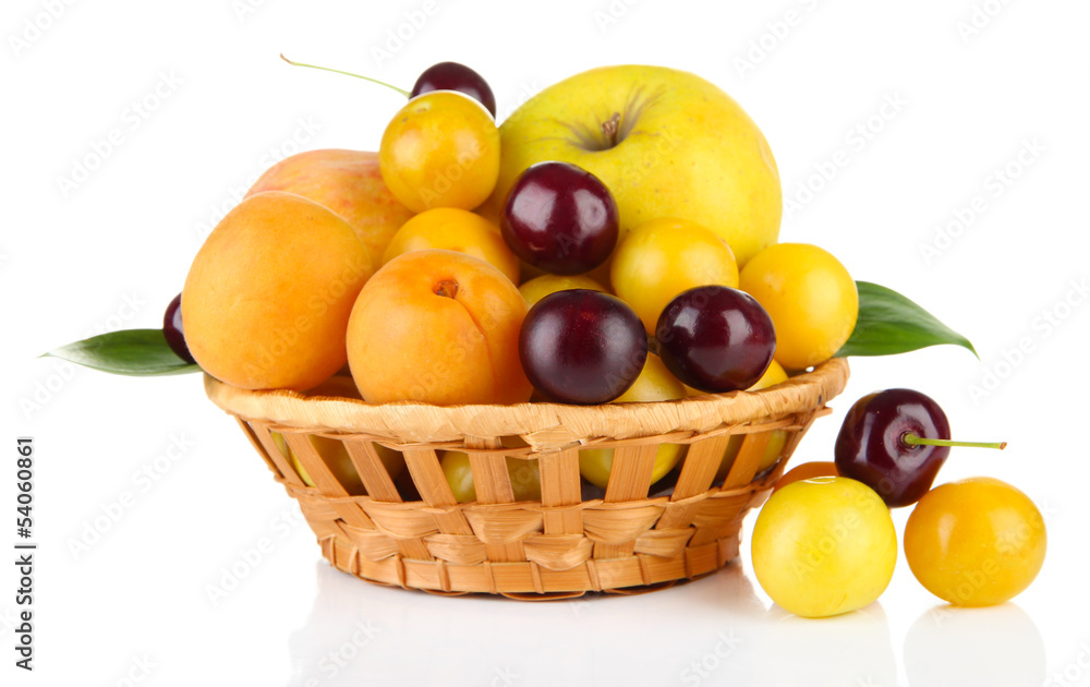 Bright summer fruits in basket isolated on white Bright summer fruits in basket isolated on white
