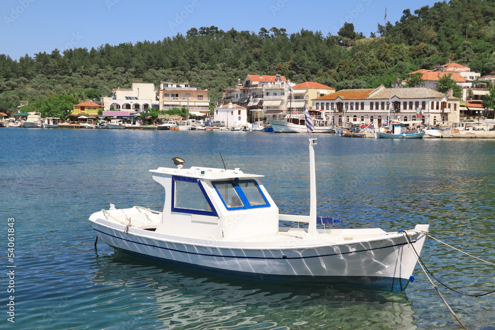 Fishing boats in the old port of Limenas , in Thassos island , G