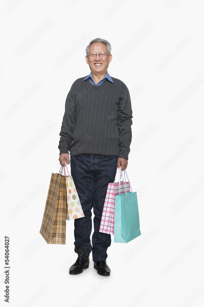 Senior man with shopping bags Senior man with shopping bags