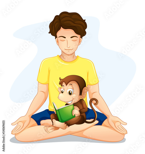 A boy doing yoga with a monkey reading