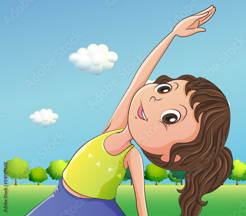 A cute little girl exercising