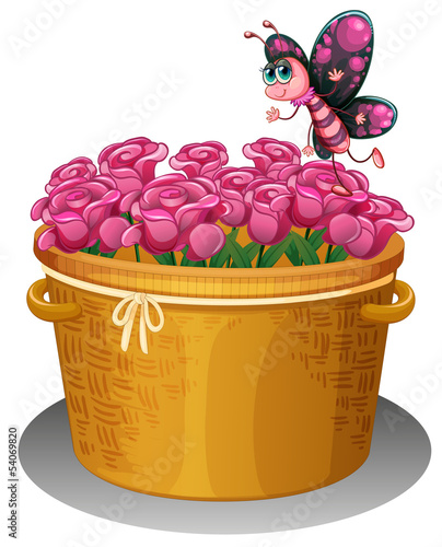 A basket of pink roses with a butterfly