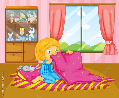 A girl folding her blanket