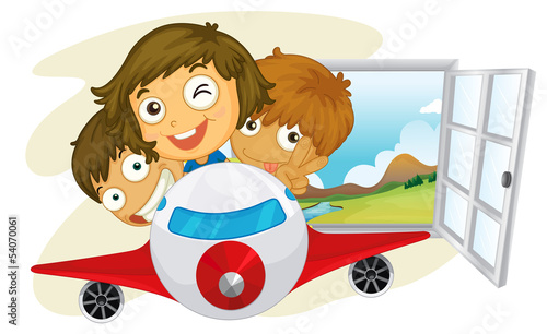 Happy children riding on a jetplane