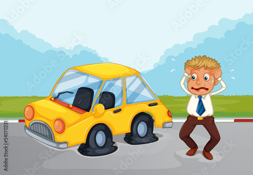 A sweaty man beside his car with flat tires